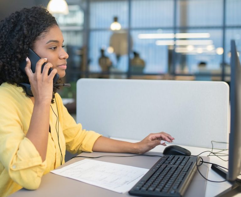 Lady using laptop to give feedback or request help